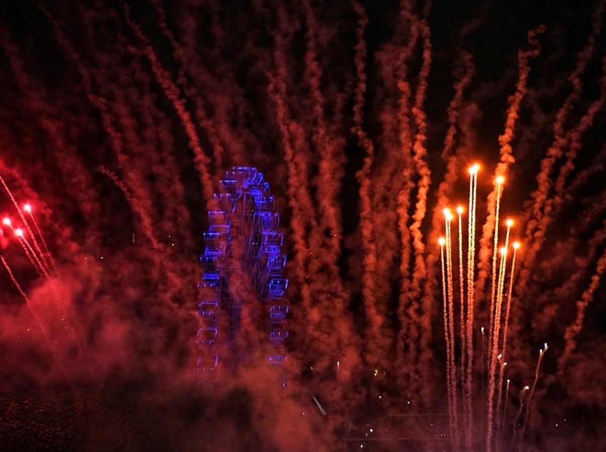 Fireworks illuminate a Ferris wheel at night, people silhouettes watching the celebration. - after AI removed all people